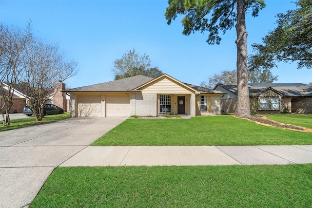 view of front of property featuring driveway, roof with shingles, a front lawn, a garage, and brick siding