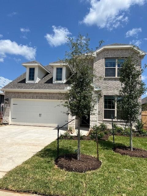 26711 Grandiflora Dr, Magnolia, TX 77355 - view of front of house featuring driveway and a garage