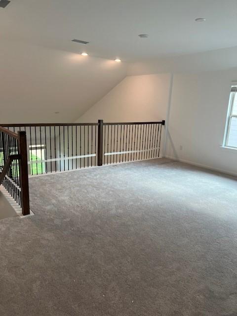 26711 Grandiflora Dr, Magnolia, TX 77355 - additional living space featuring carpet floors and vaulted ceiling