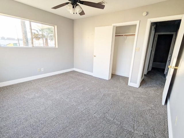 unfurnished bedroom featuring carpet flooring, baseboards, a closet, and ceiling fan