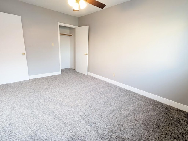 unfurnished bedroom with a ceiling fan, baseboards, a closet, and light carpet