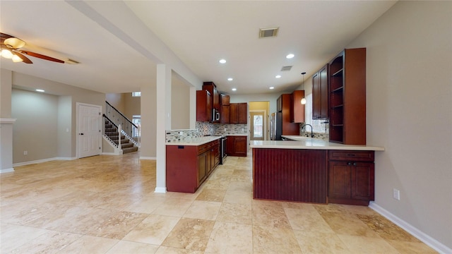 kitchen with visible vents, open shelves, stainless steel appliances, a sink, and light countertops