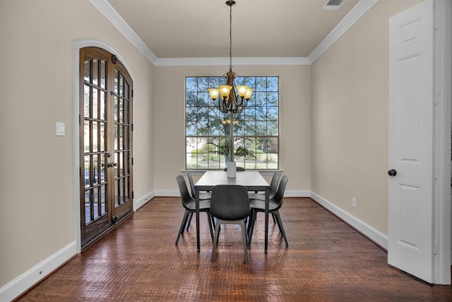 dining area with a chandelier, baseboards, ornamental molding, and dark wood-style flooring