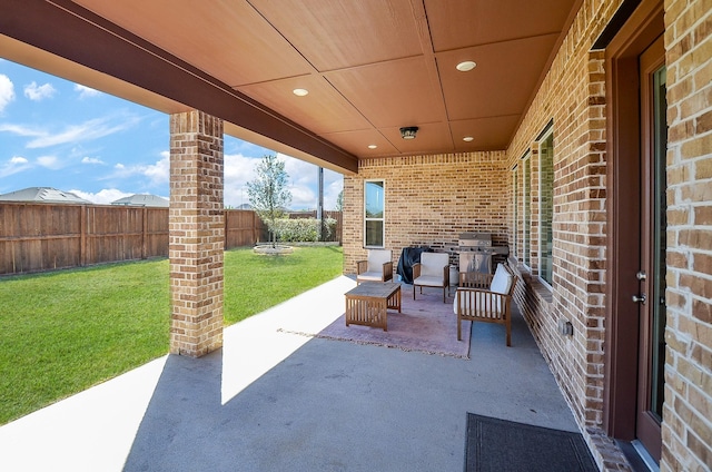 view of patio / terrace featuring a grill and a fenced backyard