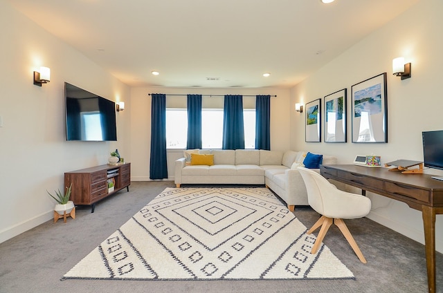 living area featuring carpet flooring, recessed lighting, and baseboards