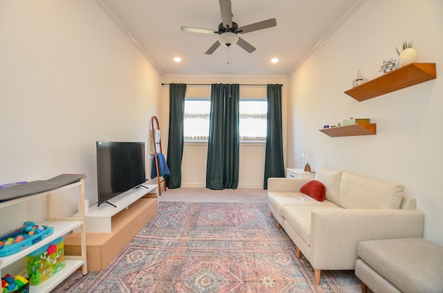 carpeted living room with recessed lighting, baseboards, ornamental molding, and a ceiling fan