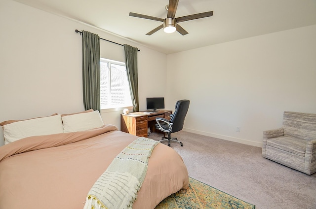 bedroom featuring ceiling fan, baseboards, and carpet floors