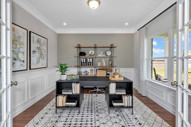 office area featuring dark wood-style flooring, crown molding, and a decorative wall