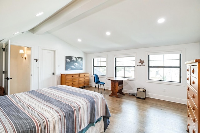 bedroom with lofted ceiling with beams, baseboards, wood finished floors, and recessed lighting