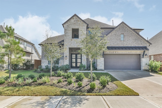 french country style house featuring concrete driveway, a garage, fence, and stone siding