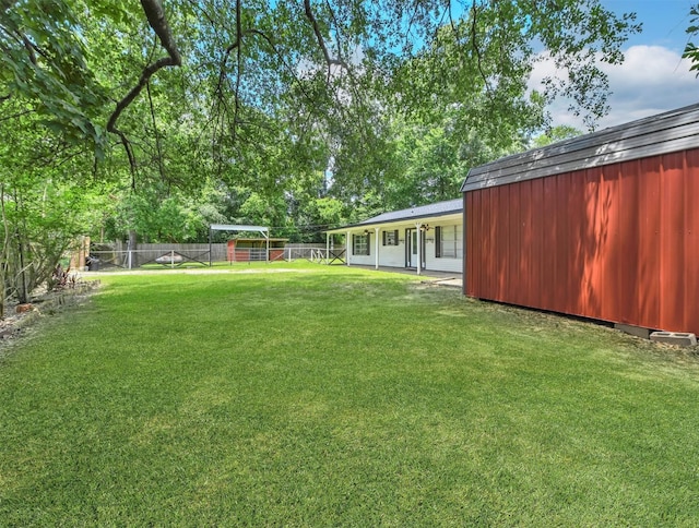 view of yard with a fenced backyard