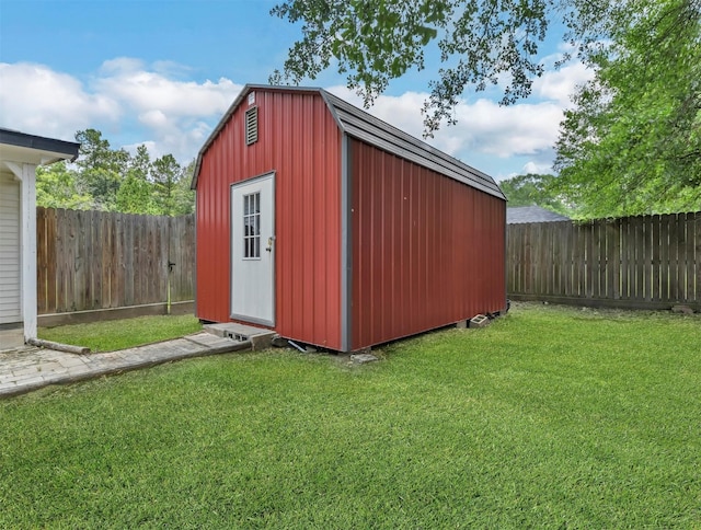 view of shed featuring a fenced backyard