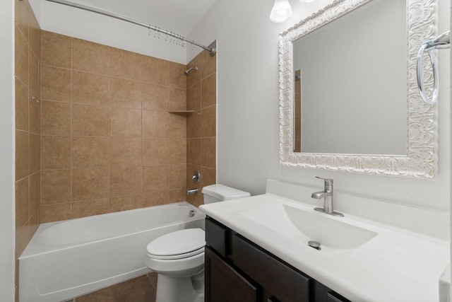 bathroom with tile patterned floors, tub / shower combination, toilet, and vanity