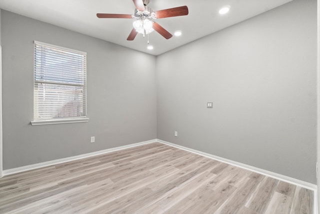 spare room with recessed lighting, baseboards, light wood-style floors, and ceiling fan