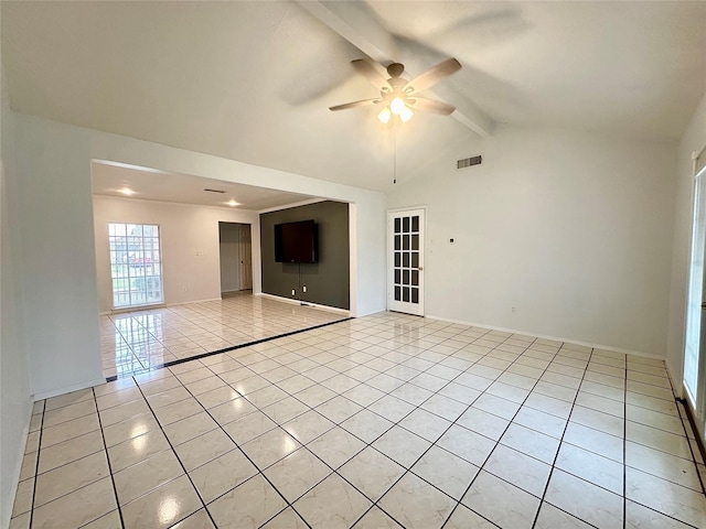 spare room with baseboards, visible vents, lofted ceiling with beams, light tile patterned flooring, and ceiling fan