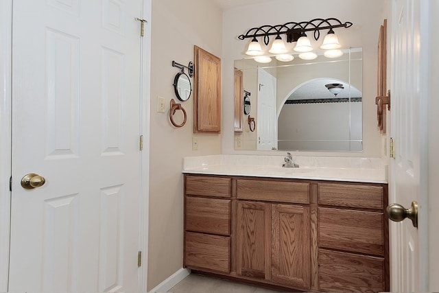 bathroom with vanity and tile patterned flooring