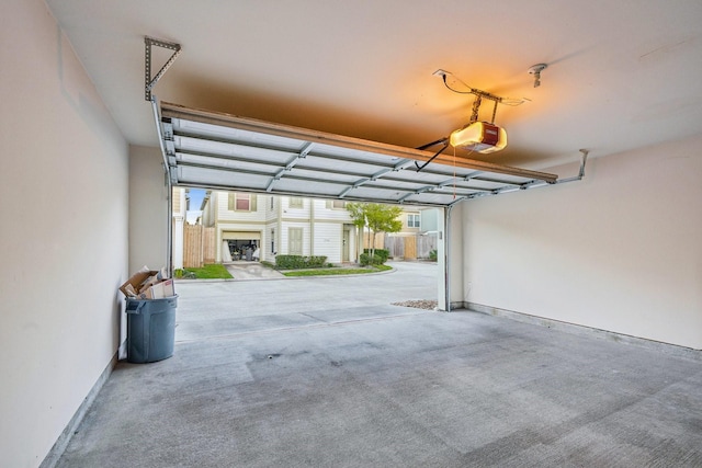 garage featuring a garage door opener