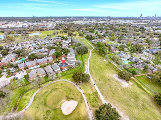 birds eye view of property with a residential view