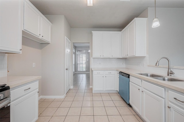 kitchen featuring a sink, dishwashing machine, tasteful backsplash, and light tile patterned flooring