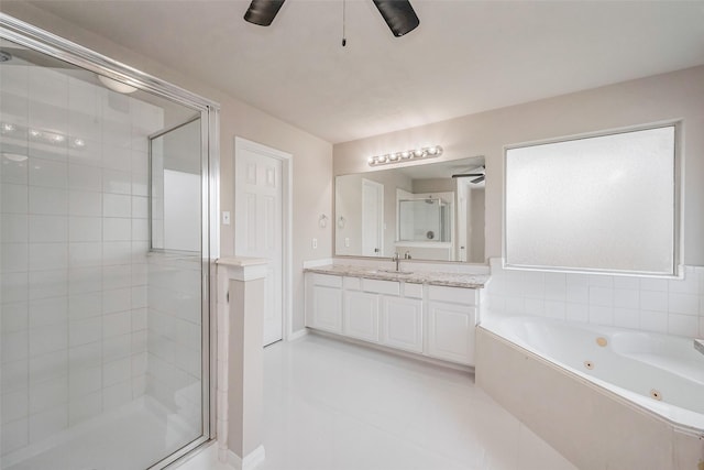 full bathroom with vanity, a shower stall, a whirlpool tub, and ceiling fan