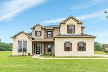 view of front facade with a front lawn