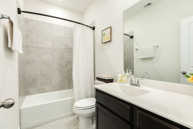 bathroom featuring visible vents, shower / bath combo with shower curtain, toilet, and vanity