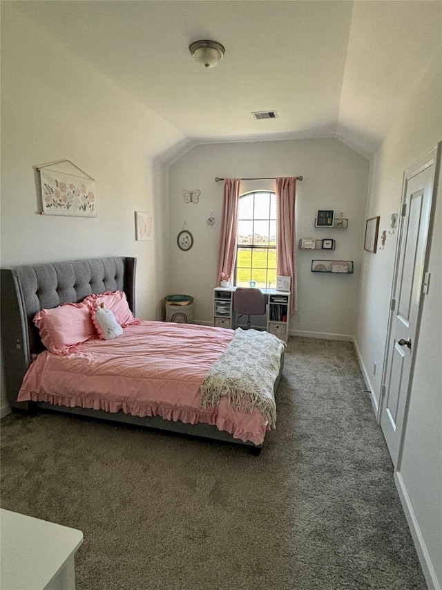 carpeted bedroom featuring visible vents, lofted ceiling, and baseboards