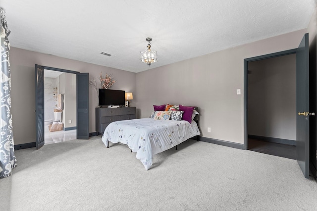 bedroom featuring baseboards, visible vents, carpet floors, a textured ceiling, and a chandelier