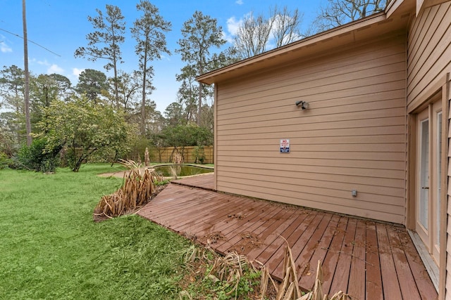 deck featuring a lawn