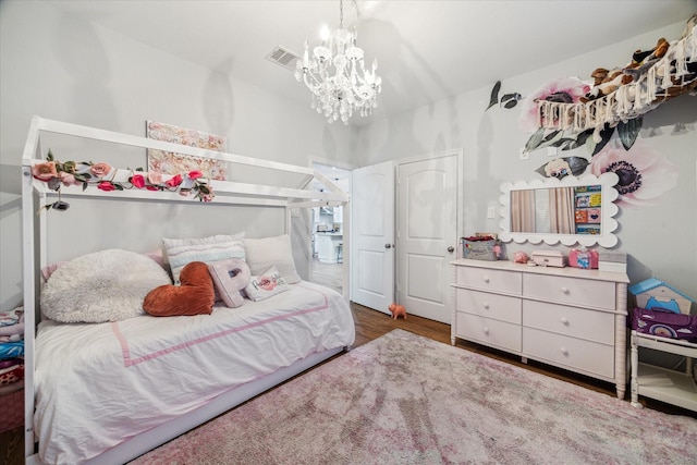 4113 Ella Blvd, Houston, TX 77018 - bedroom featuring a notable chandelier, wood finished floors, and visible vents