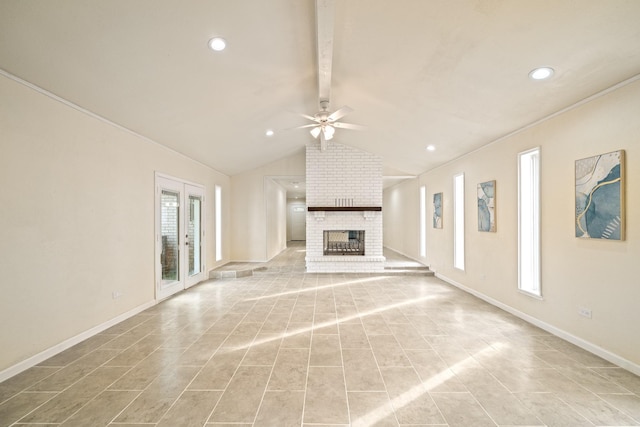 unfurnished living room with baseboards, lofted ceiling with beams, french doors, a fireplace, and a ceiling fan