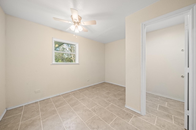 unfurnished room featuring light tile patterned floors and a ceiling fan