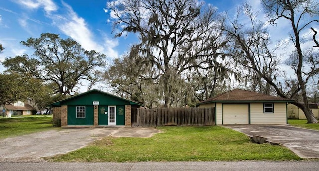 ranch-style house featuring a front lawn, aphalt driveway, fence, a garage, and brick siding