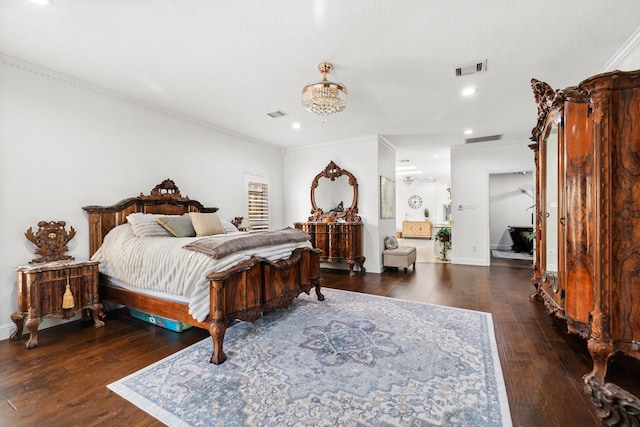 bedroom featuring hardwood / wood-style flooring, visible vents, and recessed lighting