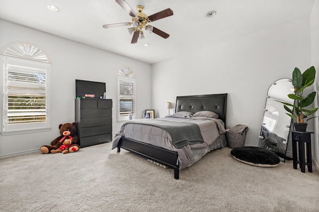 bedroom featuring a ceiling fan, baseboards, carpet, and recessed lighting