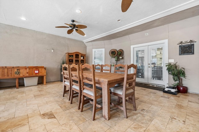 dining space with a ceiling fan, french doors, stone finish floor, and recessed lighting