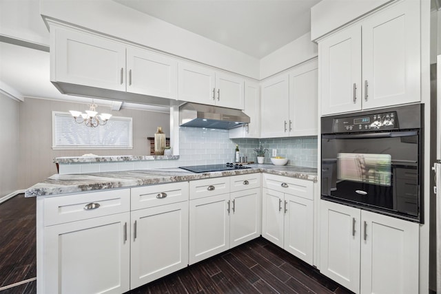 kitchen featuring backsplash, dark wood-type flooring, under cabinet range hood, white cabinets, and black appliances