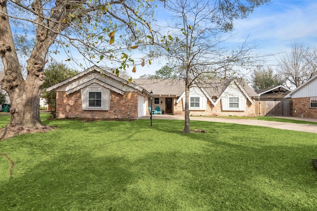 ranch-style home featuring brick siding, a front lawn, fence, concrete driveway, and a garage