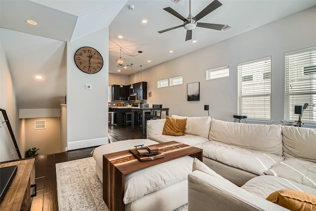 living area featuring recessed lighting, visible vents, wood finished floors, and a ceiling fan