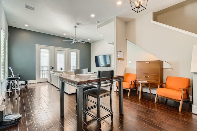 kitchen with dark wood-type flooring, recessed lighting, baseboards, and visible vents