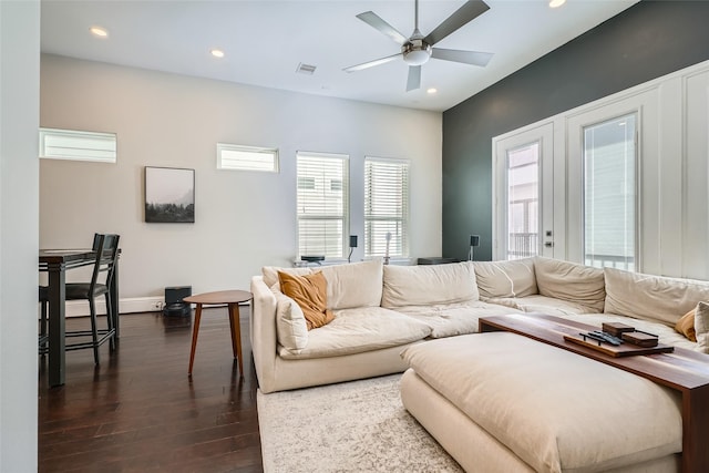 living room featuring visible vents, baseboards, ceiling fan, recessed lighting, and dark wood-style floors