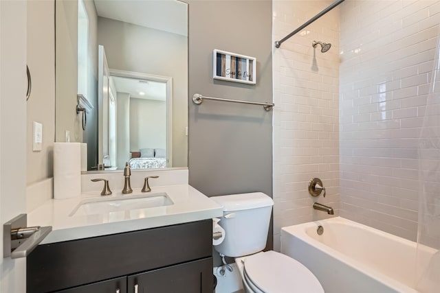 full bath with connected bathroom, toilet, vanity, and shower / tub combination