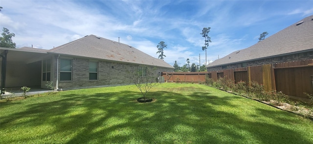 view of yard featuring fence