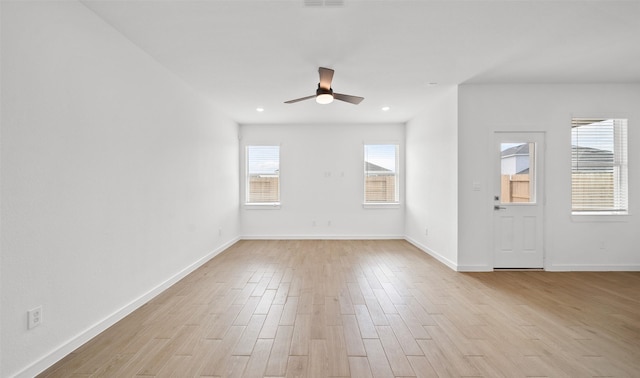 interior space with recessed lighting, ceiling fan, baseboards, and light wood-style floors