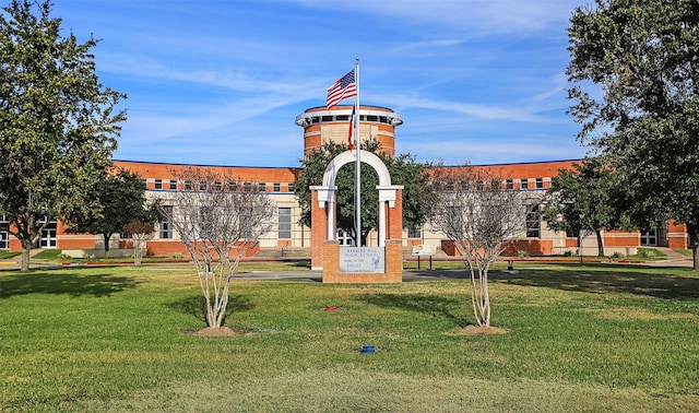 view of community featuring a yard