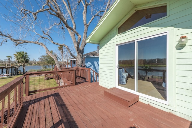 wooden terrace with a water view