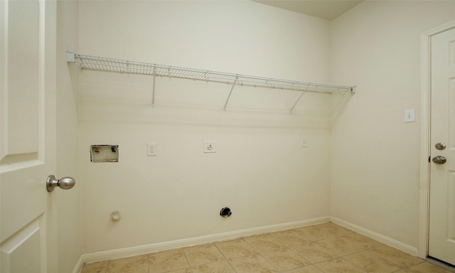 clothes washing area featuring laundry area, hookup for a washing machine, baseboards, and electric dryer hookup