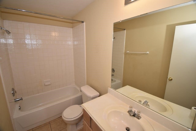 full bathroom featuring tile patterned floors, vanity, toilet, and washtub / shower combination