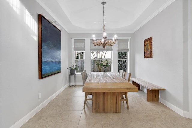 dining room featuring an inviting chandelier, a raised ceiling, light tile patterned floors, and baseboards