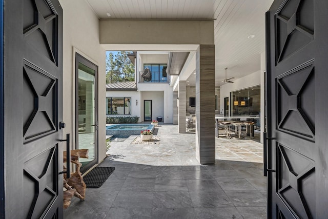 foyer entrance featuring wood ceiling